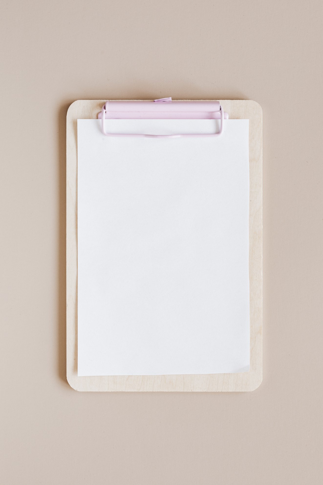 Mockup of White Clipboard with Blank Paper